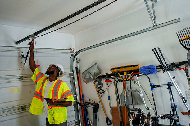 Professional Garage Door Panel Replacement technician working in Manassas Park, VA